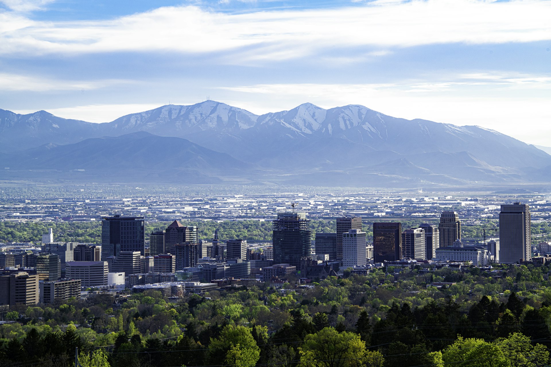 Salt Lake City skyline with mountains behind it